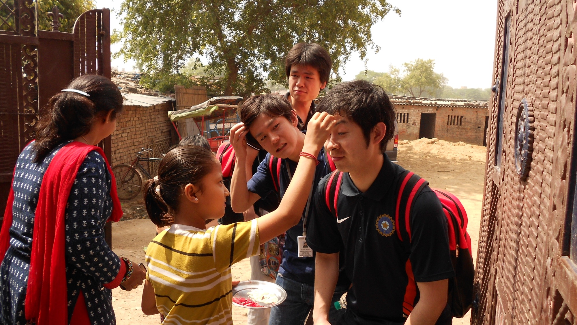 Corporate volunteers interacting with RHSS children